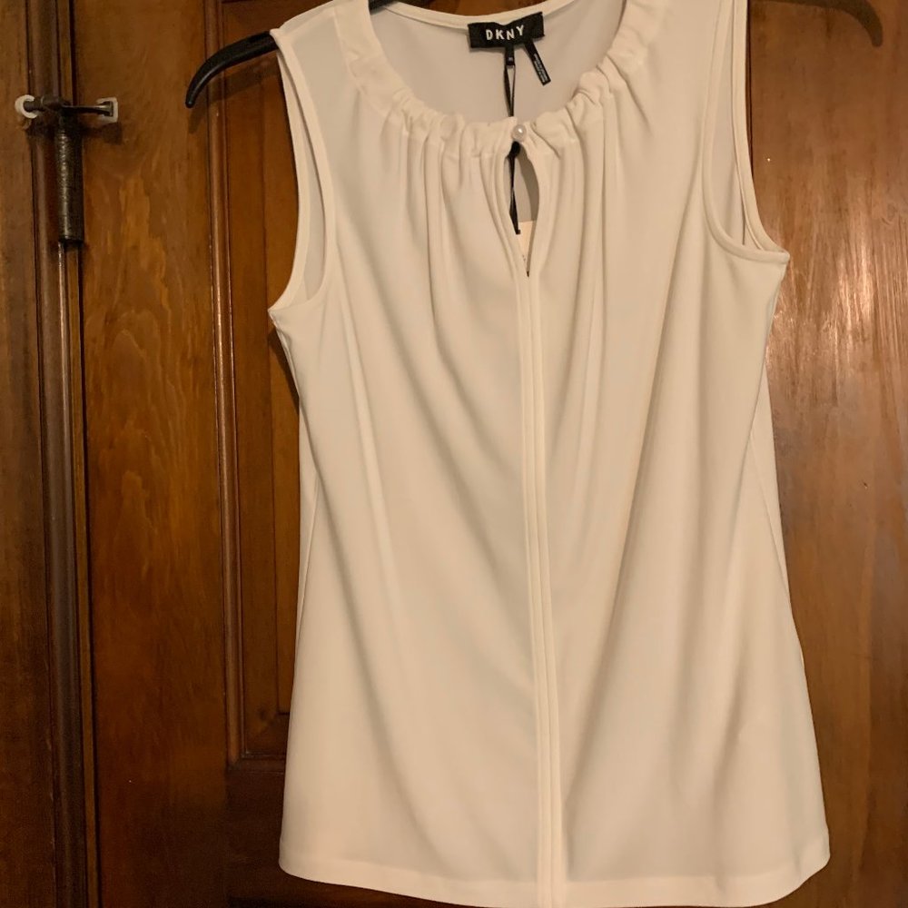 White DKNY Sleeveless top, keyhole closure with pearl button, xs